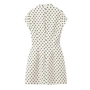 Detailed back view of white short sleeve mini dress with black polka dot pattern