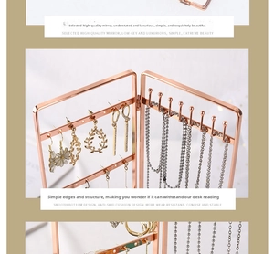 Close-up of rose gold plated metal jewelry stand with necklace hooks and earring holes