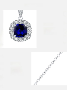 Dettaglio collana in argento S925 con zaffiro blu taglio cushion e alone di zirconi