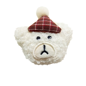 Cute white plush bear accessory with a red plaid hat and white pompom on top