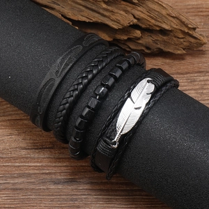 Men's multilayer black leather bracelet set featuring feather pendant and wood beads