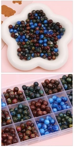 Mix of 8-12mm resin beads displayed in a white floral dish and organized in a storage box