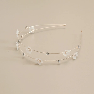 Detail of double-layer gold headband with white flowers, pearls and crystals