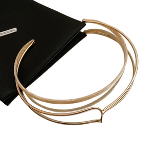 Modern gold multi-layered choker with marble resin inlays on a geometric design