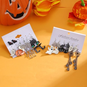Detailed set of Halloween earrings featuring ghost, pumpkin, and bat designs
