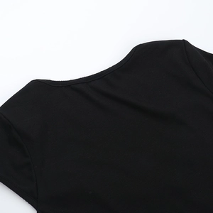 Detailed close-up of a black lace-up corset top showing high-quality stitching and neck detail