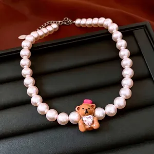French pearl beaded necklace with brown bear pendant and pink heart crystal decoration