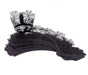 Detailed laser-cut spider web pattern on black paper cupcake liners for Halloween decor