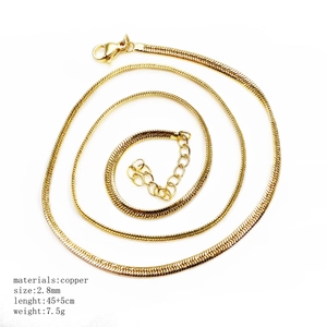 Detail view of 2.8mm golden snake chain necklace made of high-quality copper material