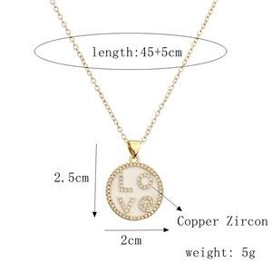 Detail view of gold LOVE pendant showing dimensions 2cm diameter and copper zircon material
