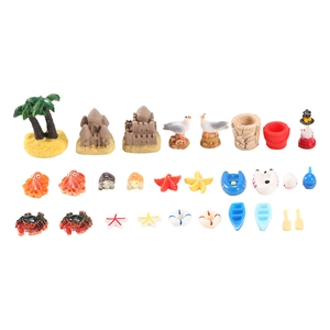25-piece miniature ocean beach resin kit with palm trees, sand castles, and sea creatures