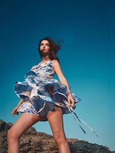 Blue and white floral mini dress with layered ruffle hem and one-shoulder strap