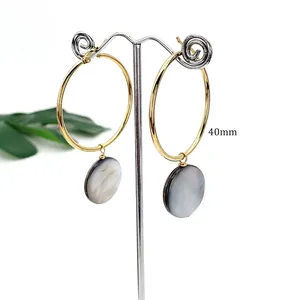 Minimalist gold stainless steel 40mm hoop earrings with natural shell pendants