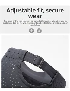 Detail of dark grey baseball cap featuring breathable laser-cut holes and adjustable metal buckle