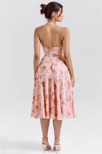 Detailed back view of a pink floral halter midi dress showing the zipper closure and cut