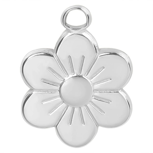 Detailed view of silver six-petal flower pendant with radial texture and ring loop
