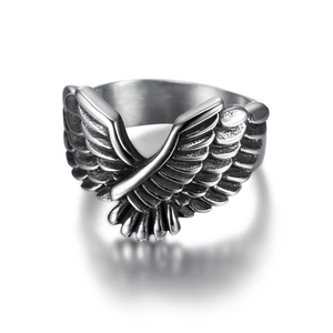 Vintage stainless steel eagle wing ring with detailed feather texture in a retro finish