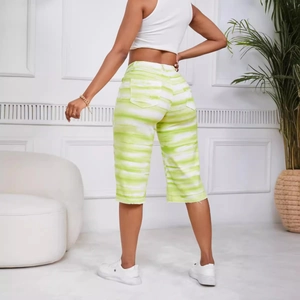 Women's high waist green and white tie-dye denim shorts in a relaxed casual fit