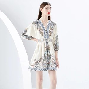 Boho V-neck paisley print mini dress with lantern sleeves and matching belt on white background