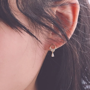 French luxury S925 silver needle drop earrings with sparkling round rhinestones on model
