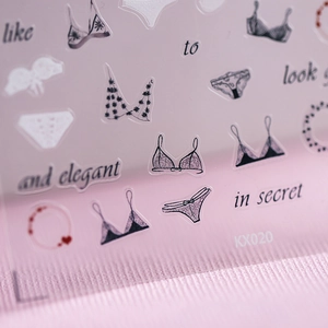 Minimalist Japanese 5D nail art stickers with delicate black line lingerie and heart motifs
