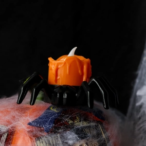 Halloween spider LED candle light with orange pumpkin-colored body for festive party decor