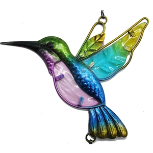 Detail of colorful hummingbird wall decor featuring vibrant gradient metal and glass wings