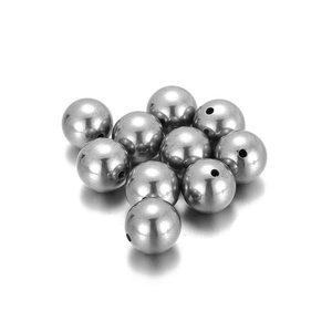 Perles rondes en acier inoxydable poli avec trous pour la création de bijoux DIY