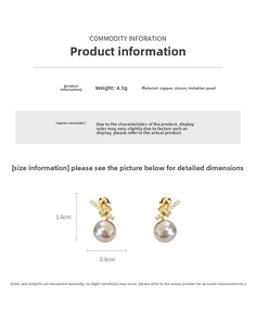 Detail showing 4.3g 18k gold-plated earrings with zircon crossover and grey pearl charm