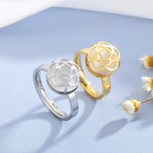 Floral stainless steel rings in gold and silver finish with pearl center detail
