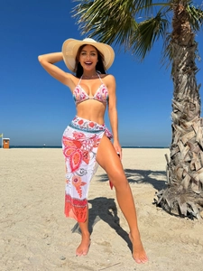 Three-piece floral print bikini set with matching long split beach sarong wrap