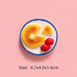 Detailed macro view of 4.7cm resin breakfast miniature with pancake and strawberries