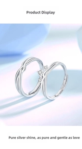 Macro detail of intertwined S925 silver couple rings with small zircon accents