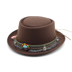 Brown wool felt fedora hat with turquoise stone and bohemian tassel band detail