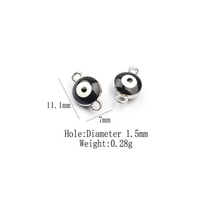 Detail of 11.1mm x 7mm black enamel evil eye alloy charms with dual 1.5mm hanging loops