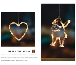 Close-up of heart and Santa LED hanging lights with warm white bokeh glow for Christmas