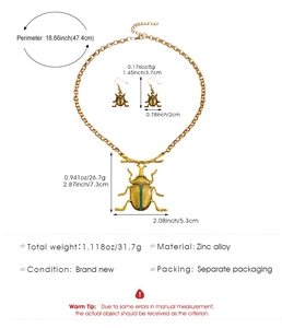 Dimensioni dettagliate del set gioielli scarafaggio vintage con cristalli blu e oro