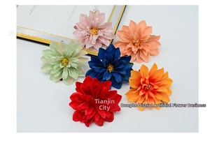 Detail of vibrant faux dahlia flowers in six colors for DIY floral headpieces