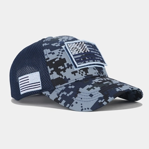 Detail of digital camouflage baseball cap featuring tactical American flag embroidery and mesh