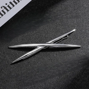 Three-piece silver metal hair clip set featuring geometric crisscross V-shape designs