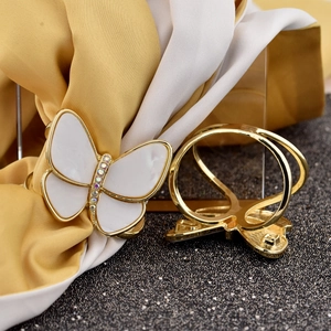 Elegant gold butterfly scarf clip with white shell inlay and colorful rhinestones