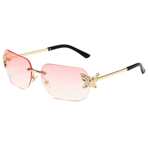 Frameless square butterfly sunglasses with pink gradient lenses and golden metal accents