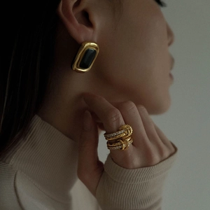 Elegant gold titanium earrings with black rectangle stone and multilayered zircon ring set