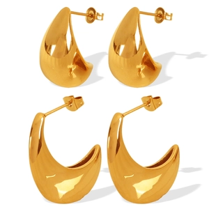 Minimalist golden metal water drop earrings presented on a clean white background