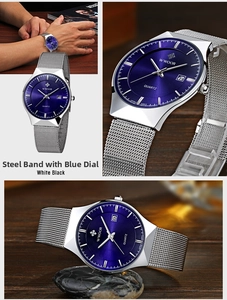 Macro detail of men's watch with blue sunray dial and silver mesh steel strap