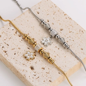 Floral snake chain bracelet with sparkling zircon beads in gold and silver plating