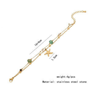 Detail view of starfish pendant and natural stone beads on a golden stainless steel chain