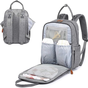 Detail of gray foldable baby bag showing inner layers and ergonomic back system