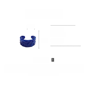 Detail view of dark blue acrylic cuff bracelet showing 6.5cm diameter and 22g weight