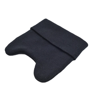 Black knit beanie hat with cat ears and folded brim on white background for women